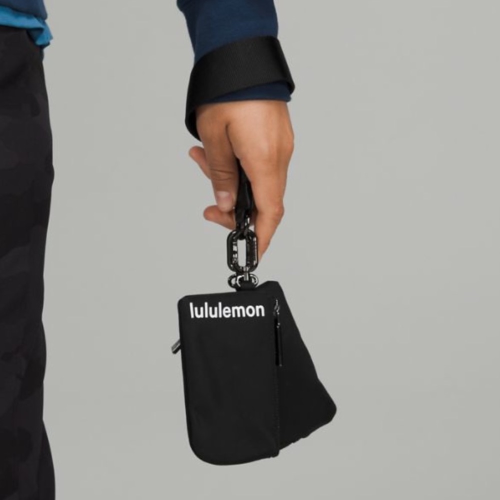 NWT Lululemon Dual Pouch Wristlet! Black Hardware! Comes with proof of purchase! - Picture 9 of 14